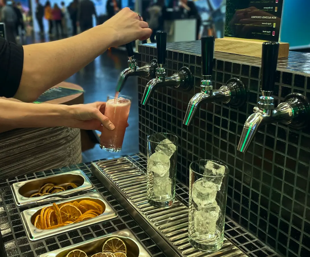 a bartender tapping cocktail